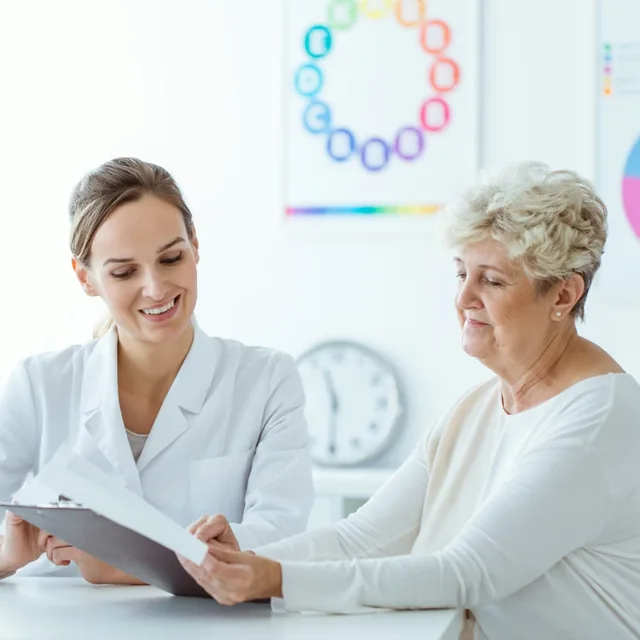 A NutriWave coach going through a client's scan results